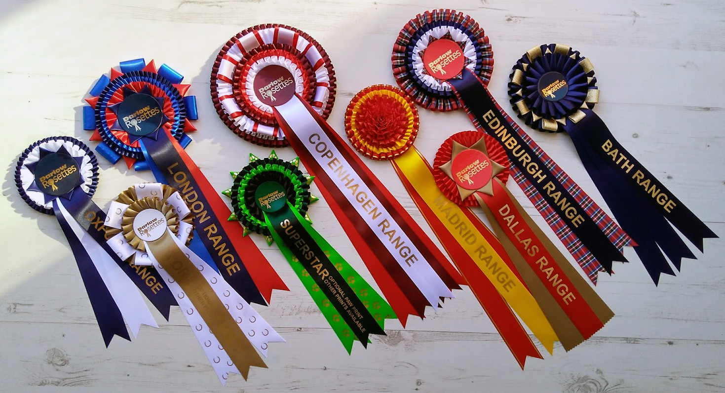 A grouping of some of our Designer range rosettes
